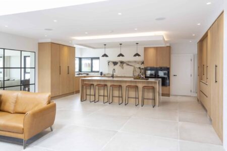 Open-plan Verta kitchen viewed from the adjoining living area