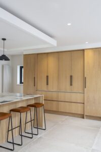 Verta oak cabinetry with a closed breakfast cupboard