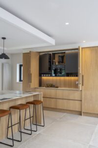 Verta breakfast cupboard open to reveal an illuminated work area