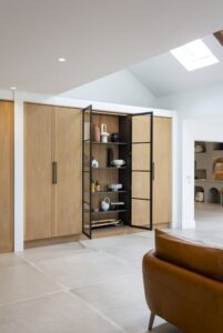 Verta glazed display cupboard with its door open